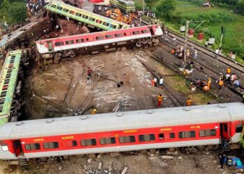 Image representing the aftermath of the Odisha train crash, depicting the wreckage and rescue operations.