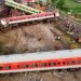 Image representing the aftermath of the Odisha train crash, depicting the wreckage and rescue operations.